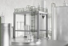 Epoch Biodesign to Open London Nylon 6,6 Biorecycling Plant Industrial processing plant with large stainless steel tanks, platforms, and a laddered catwalk