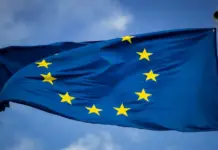EURATEX Urges EU Commission for Faster Action on Trade, Regulation and Industrial Competitiveness European Union flag waving on a bright blue sky with a circle of twelve yellow stars