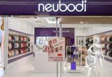 BrilliA Acquires Neubodi to Expand Branded Retail Presence in Southeast Asia Neubodi lingerie store interior with mannequins in bras, rows of underwear on shelves, and a sign advertising bra fitting services.